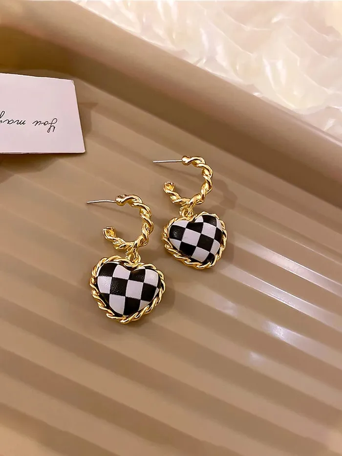 Yellow Chimes Earrings for Women and Girls Drop Earrings for Girls Gold Toned Black White Heart Designed Drop Earrings Birthday Gift for girls and women Anniversary Gift for Wife Yellow Chimes Earrings