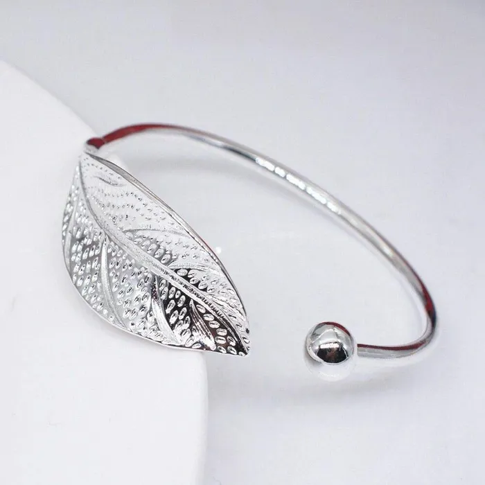 Yellow Chimes Earrings Yellow Chimes Kada Bracelet for Women Magic Open Leaf Shape Silver Plated Adjustable Wrist Band Cuff Bracelet for Women and Girls