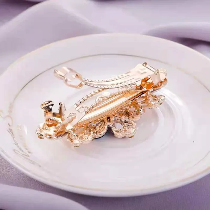Yellow Chimes Hair Clips for Girls and Women Gold Plated Floral Designed Multicolor Stone Studded French Baratte Hair Clip for Women and Girls Yellow Chimes Necklaces