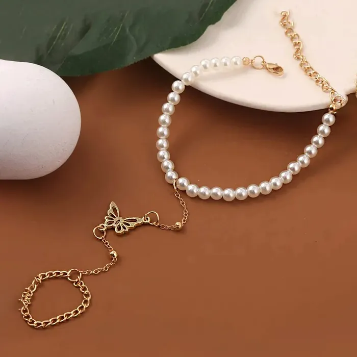 Yellow Chimes Hand Chain For Women Gold Plated Pearl Butterfly Charm Hand Chain Ring For Women and Girls Yellow Chimes Rings