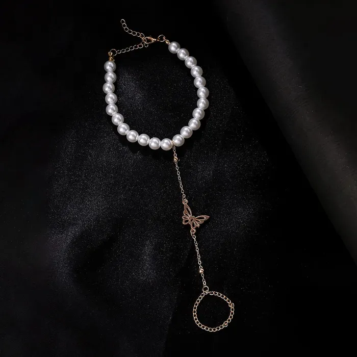 Yellow Chimes Hand Chain For Women Gold Plated Pearl Butterfly Charm Hand Chain Ring For Women and Girls Yellow Chimes Rings