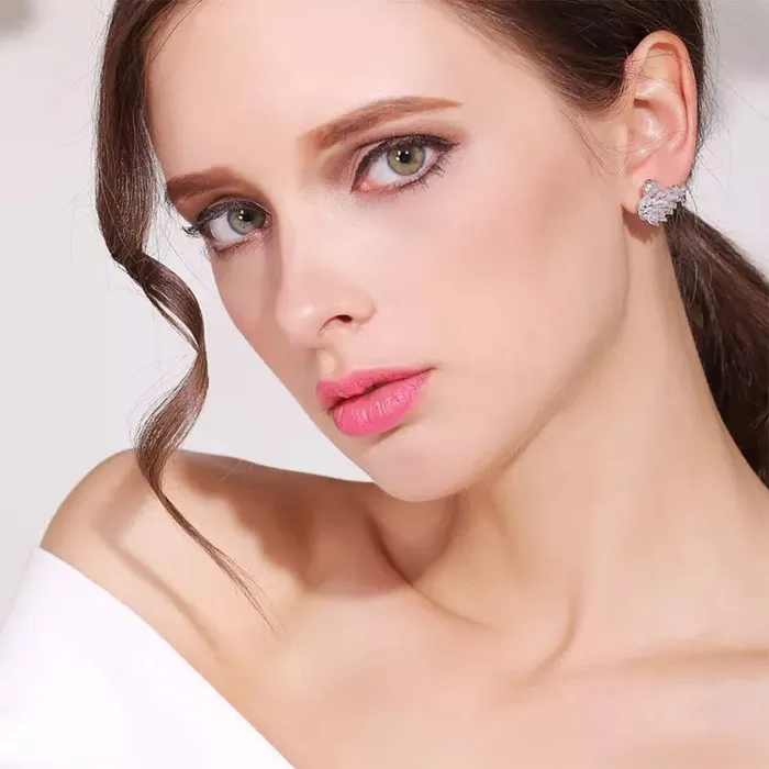 Yellow Chimes Platinum Plated Swan Design Crystal Stud Earrings for Women and Girls Yellow Chimes Earrings